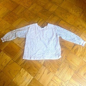 Light pink lane Bryant blouse with lacy sleeves